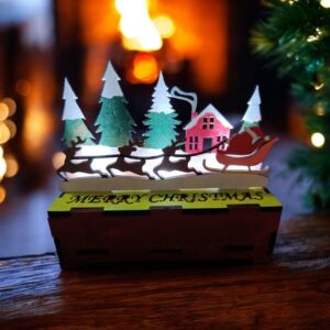 Escena navideña artesanal con luz